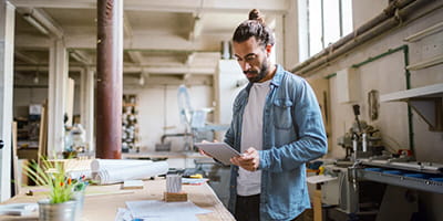 Business man looking at invoices