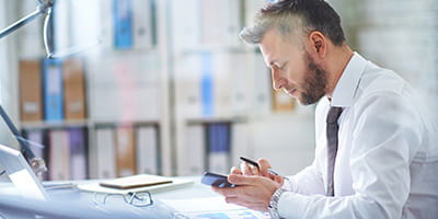 Man looking at mobile